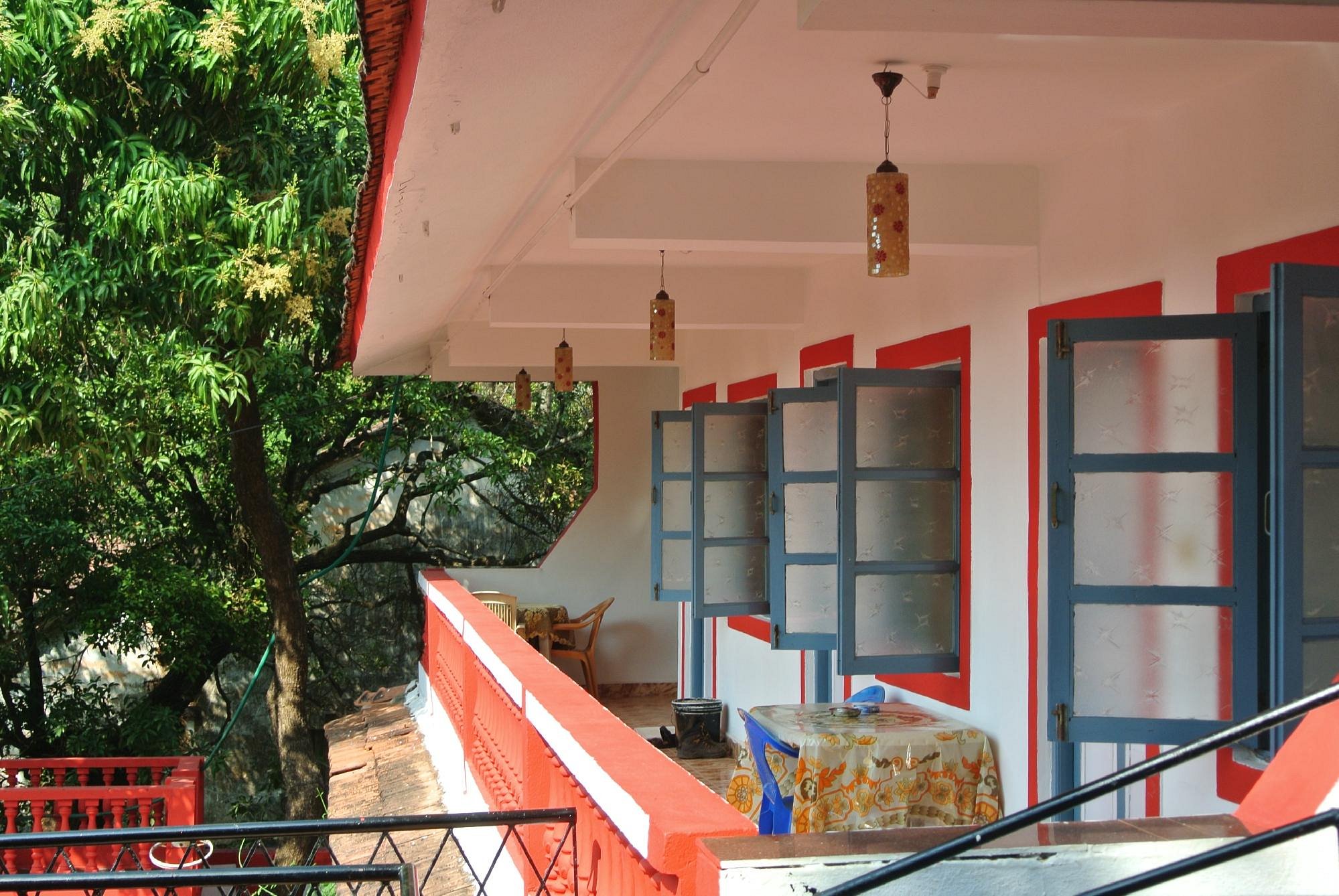 Balconies and open-air corridor at Arjun Villa
